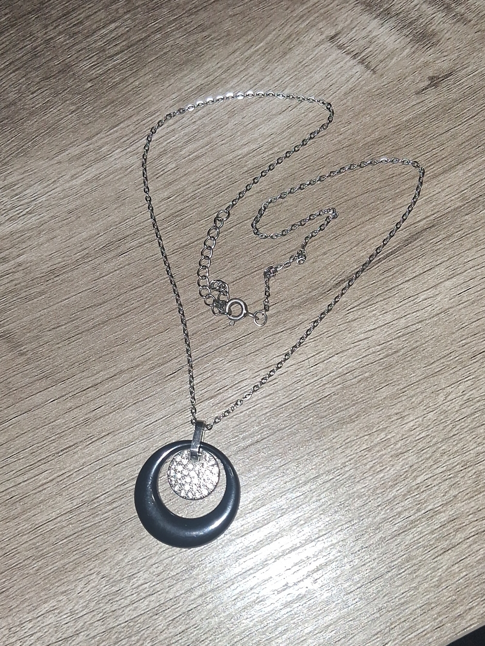 Elegant Silver-Tone Pendant Necklace with Black Accent